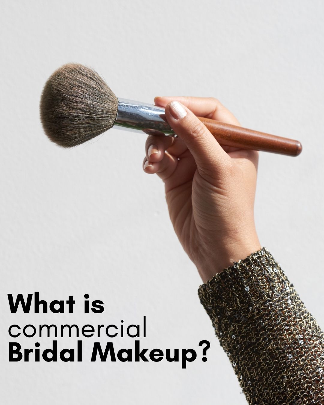 Bridal makeup artist applying heavy makeup on a bride for a commercial shoot
