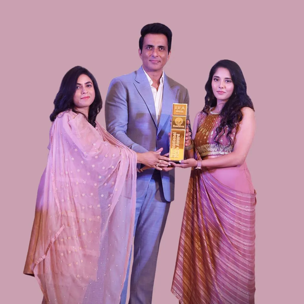 MJ Shekhar receiving the Best Makeup Artist in Bangalore award at the India Fashion Awards, presented by Sonu Sood