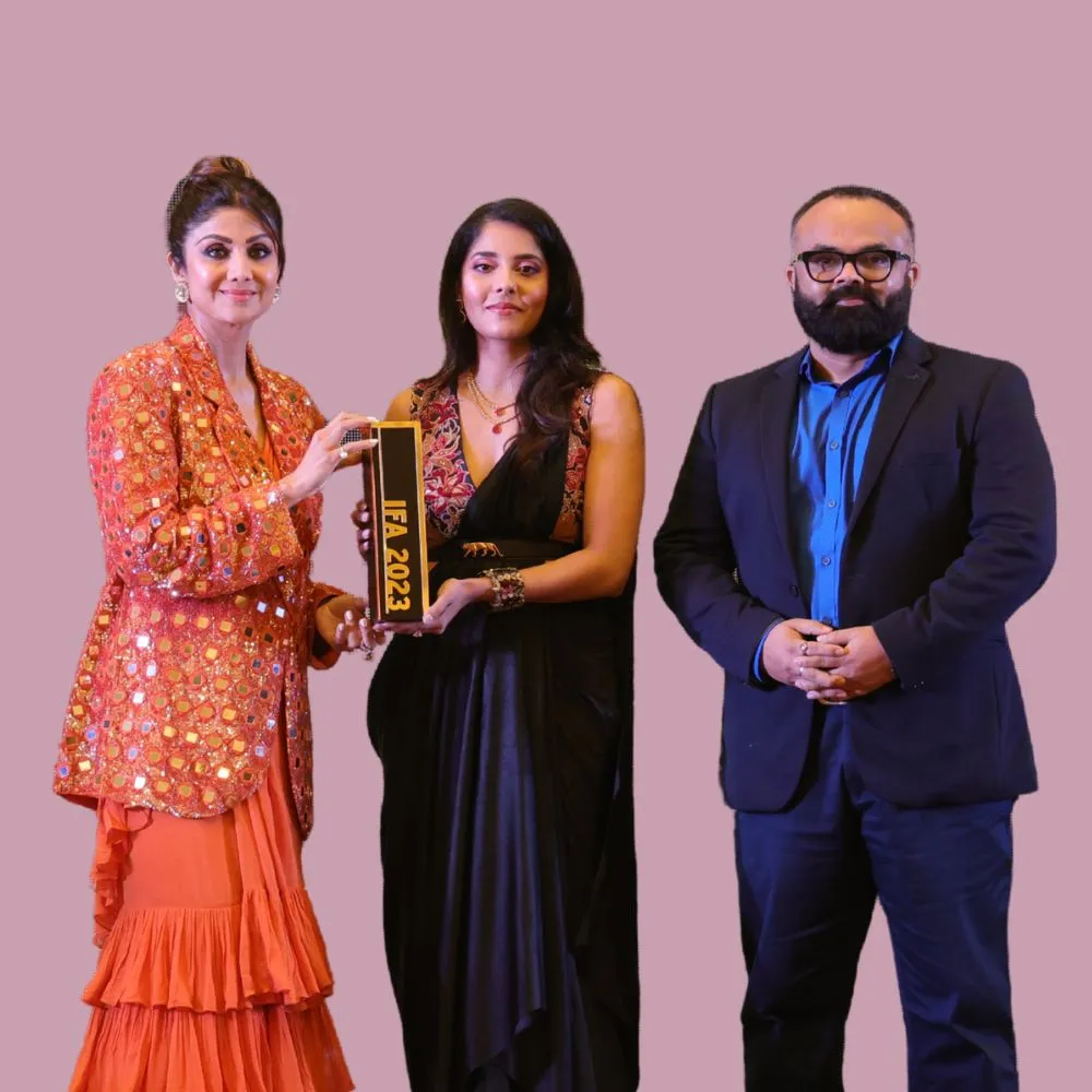 MJ Shekhar receiving the Best Makeup Artist in India award at the India Fashion Awards, presented by Shilpa Shetty