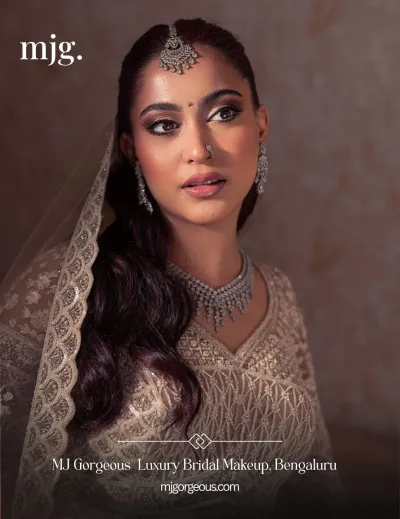 North Indian bride in soft glam makeup with veil and bridal jewellery by MJ Gorgeous